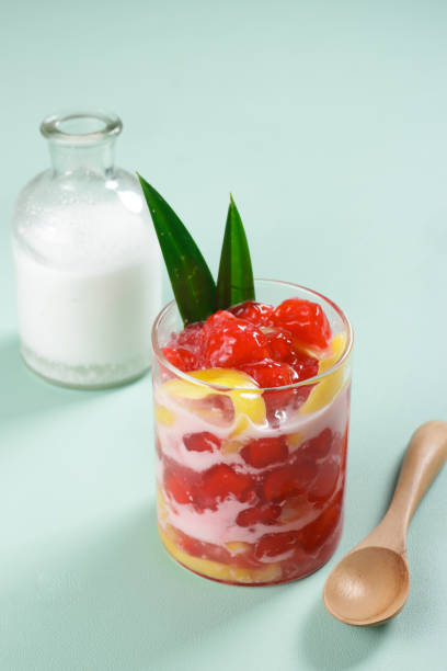 istock Thai Dessert Called Tub Tim Krob or Thai Red Ruby Dessert - made from Water Chestnut Coated with Flour served in Coconut Milk. 1473124990