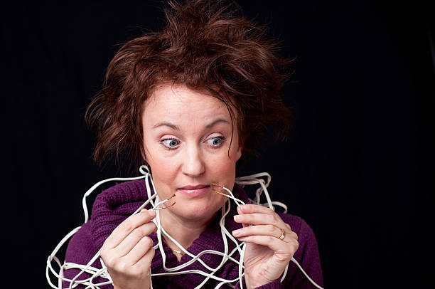 istock Woman with electric cables 147312716