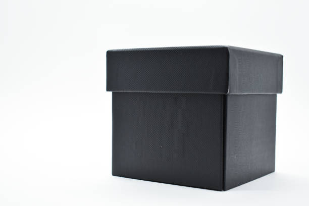 istock black paper box on white background, packaging industry 1473128068