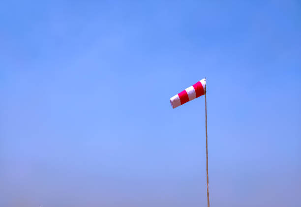 istock airport windsock or wind cone for indication of local wind direction. 1473133328