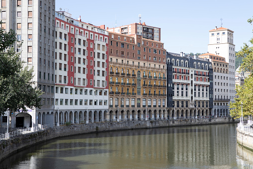 Apartment buildings along the Nervion River, Bilbao, Spain