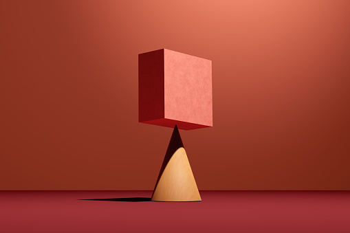 A pink cube block is balancing on a cone. Concept of balance, harmony or stability. Abstract geometrical shapes 3D render.