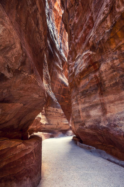 istock Pedestrian Walkway through a Canyon into the Petra Valley 1473135326