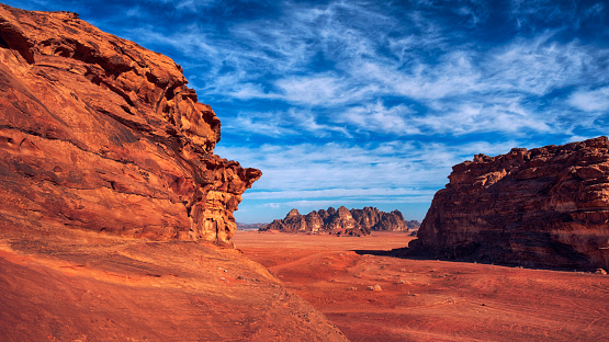 Wadi Rum, known also as the Valley of the Moon , is a valley cut into the sandstone and granite rock in southern Jordan