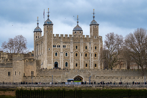 London, UK - March 12, 2023: tower of London on the Thames river in England