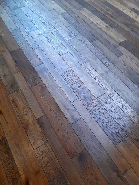 istock An oak floor with a distinctive pattern complemented by smaller and larger irregular knots has many forms. Oak planks gracefully endure a variety of surface treatments from sanding to brushing. 1473136997