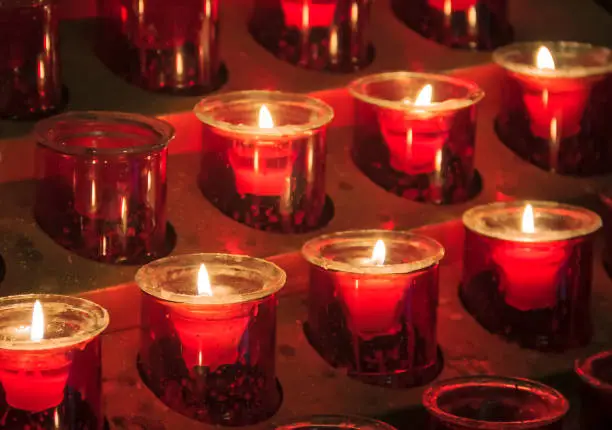 Photo of Candles lit for prayer in the Saint Nicholas Cathedral in Monaco