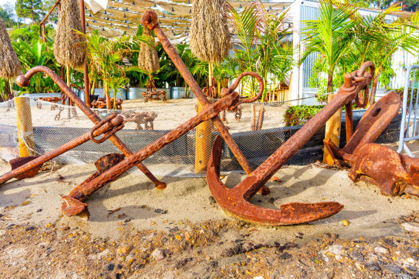 Old big rusty anchor isolated on white background