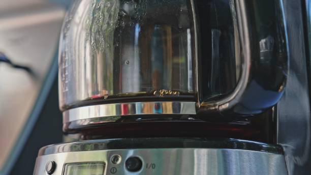 istock Grind and Brew Coffee Maker Jug with Fresh Morning Coffee 1473143288