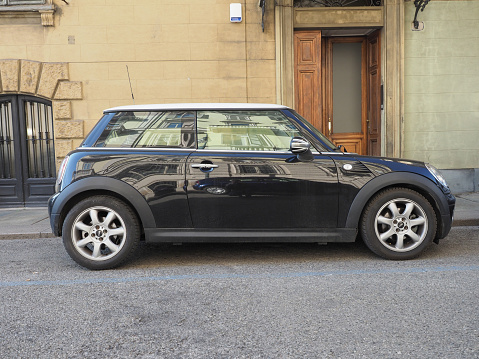 Turin, Italy - Circa February 2023: black and white Mini cooper car