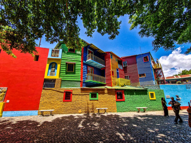 Colorful buildings in Caminito street in La Boca at Buenos Aires, Argentina. Colorful buildings in Caminito street in La Boca neighborhood at Buenos Aires, Argentina. It was a port area where Tango was born, now tourist destination with colorful houses and pedestrian stree la boca buenos aires stock pictures, royalty-free photos & images