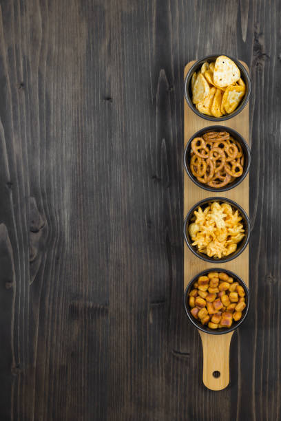 istock Light snack set on a wooden table for beer in a bar 1473144584