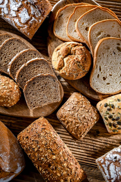 istock Assorted bakery products including loaves of bread and rolls 1473144859