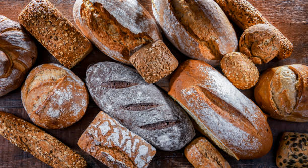 istock Assorted bakery products including loaves of bread and rolls 1473144905