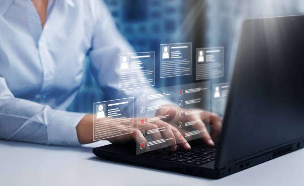 istock Human resources and management concept. Employee must complete the online survey form. Marked checklist on a clipboard. 1473146327