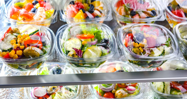 istock Boxes with fruit and vegetable salads in a commercial fridge 1473147049