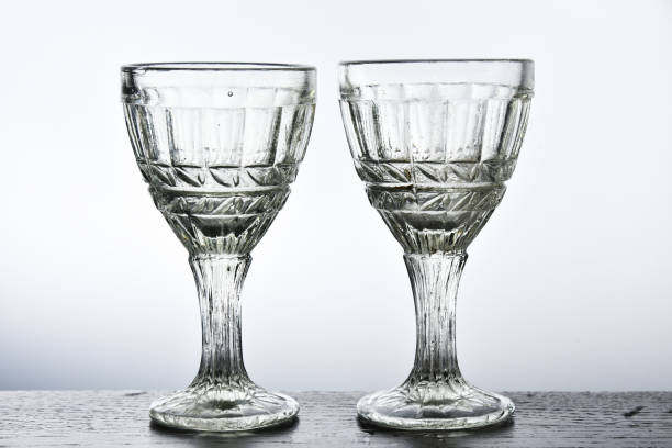 Two luxury crystal glass shot glasses Two luxury crystal glass shot glasses close up crystal chalice stock pictures, royalty-free photos & images