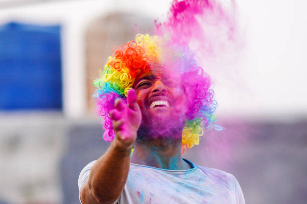 istock a indian Boy playing holi with gulala image HD 1473149757