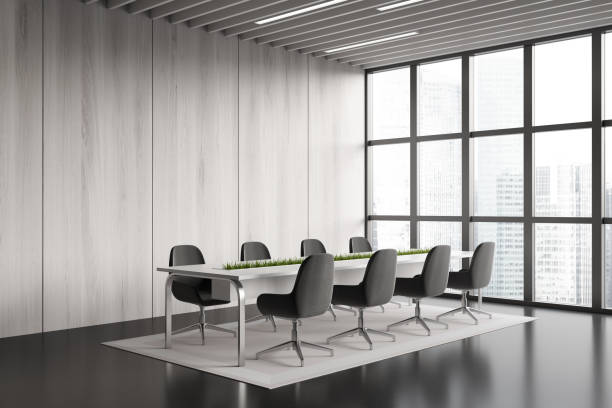 istock Stylish meeting room interior with board and panoramic window. Empty wall 1473150003