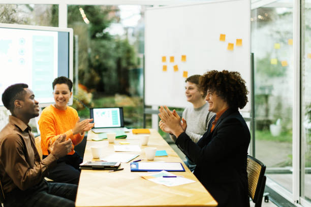 istock group of positive colleagues at work in the office 1473150332
