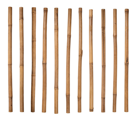 Stack of bamboo sticks lined up side by side