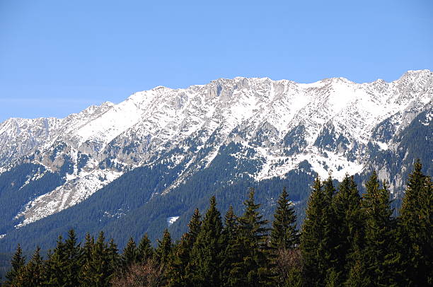 istock Snowy mountain in spring season 147315109
