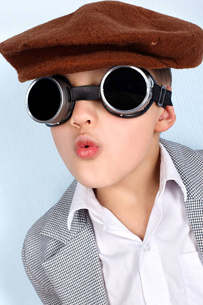 istock Funny Boy with vintage hat and black glasses 147315123