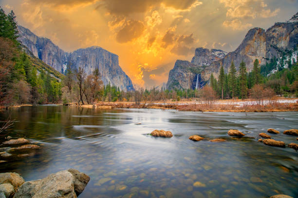 beautiful view in Yosemite valley with half dome and el capitan from Merced river stock photo
