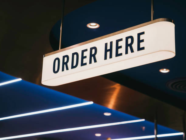 istock Order here Sign Lightbox Shop retail Signage Business 1473153488