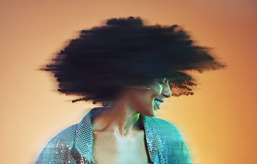 Hair blur, beauty and black woman with hair care and beauty, movement with cosmetic care against studio background. Natural curly hair, cosmetics with happiness and mockup, fashion and afro