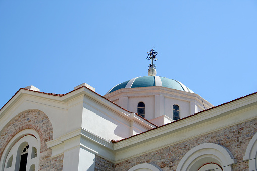 Dome of The Greek Orthodox Church  with Cross in Samos, Greece