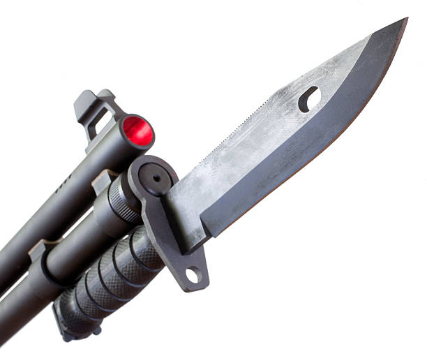 espingarda de baioneta - knife isolated on red bayonet isolated - fotografias e filmes do acervo