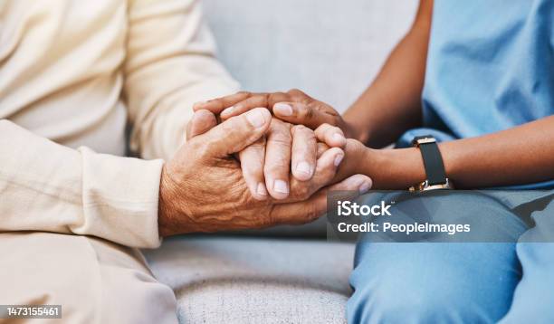 Nurse Hands And Senior Patient In Empathy Safety And Support Of Help Trust And Healthcare Consulting Nursing Home Counseling And Gratitude For Medical Caregiver Client And Hope In Consultation Stock Photo - Download Image Now