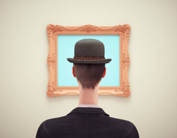 istock Human head in front of an empty painting. 1473158045