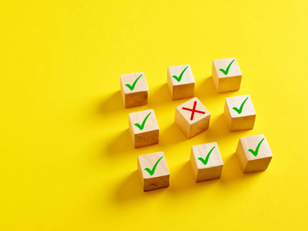 istock Choosing the wrong option, voting no or disapproval concept. Cross wrong symbol surrounded by the check mark right symbols. 1473158415