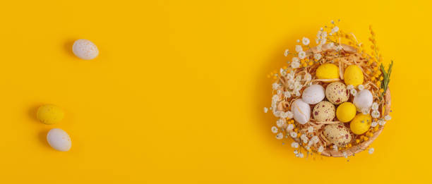 istock Easter candy chocolate eggs and almond sweets lying in a bird's nest 1473160681