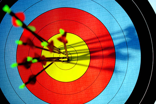 istock Arrows in bulls eye of archery target 147316138