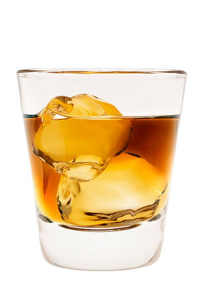 istock Whiskey on the rocks against a white background 147316284