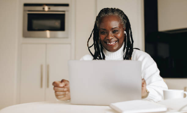 istock Happy businesswoman working from home 1473162890