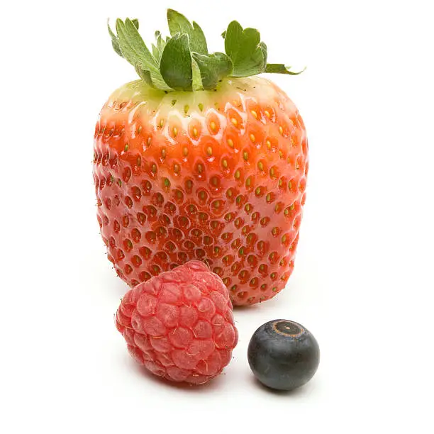 Arrangement of Soft Fruits isolated against white background.