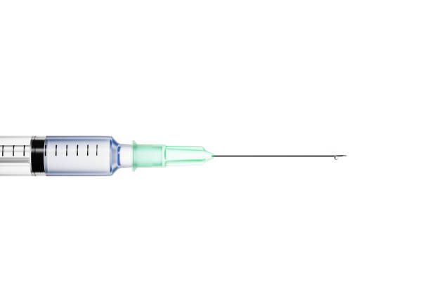 needle of a disposable syringe with a drop at the end. 3d render..