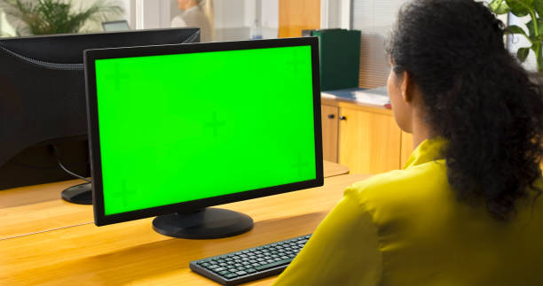 istock Woman looking at computer monitor 1473167055