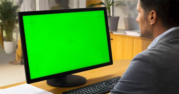 istock Man looking at computer monitor 1473167064