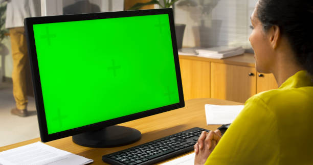 istock Woman looking at computer monitor 1473167080