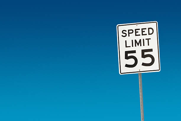 Speed Limit Sign Posted Displaying 55 Mph Stock Photo - Download Image Now - Speed Limit Sign, Number 55, Sign - iStock