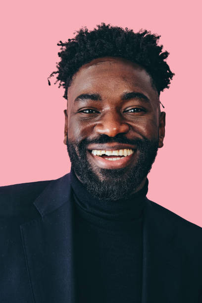 istock close up cheerful man with toothy smile and beard looking at camera 1473168492