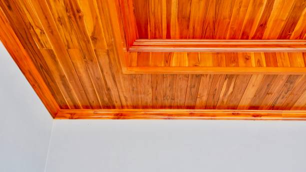 istock Modern ceiling,building ceiling wooden,teak wood material,carpenter design,ceiling is made of golden teak wood, lacquer is made from hand 1473170064