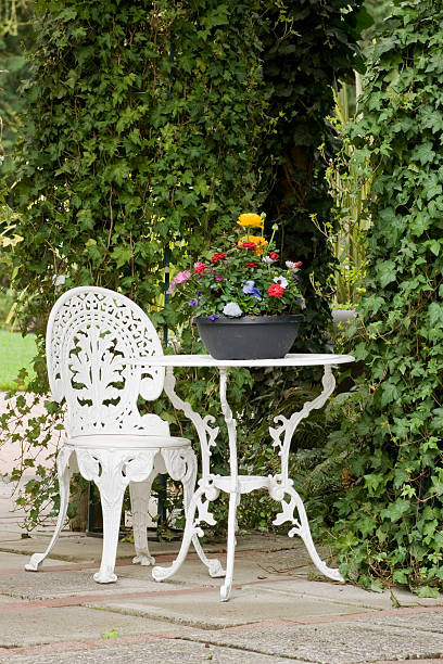 istock Wrought iron garden  table and chair 147317286