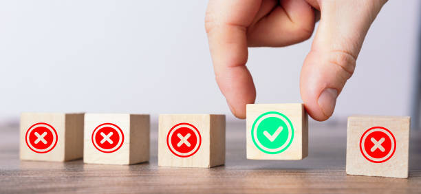 istock Crop person with blocks having correct and incorrect signs 1473174000