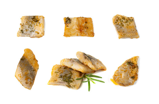 Salted Herring Fillet Pieces Isolated, Raw Pickled Fish Meat with Herbs and Spices, Marinated Herring on White Background